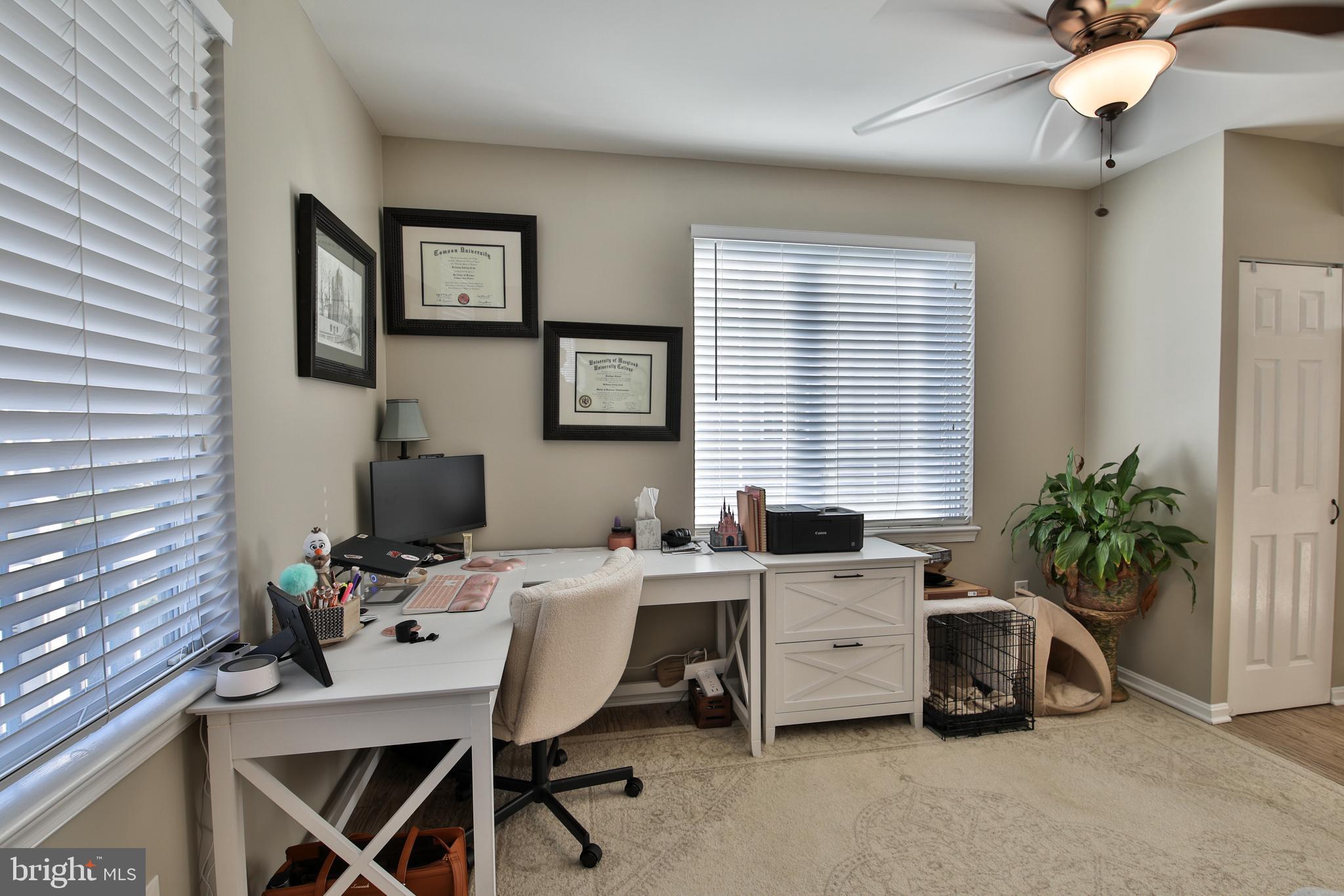 201 Mariners Point Drive Middle River, MD 21220 - Photo 20 of 53 a view of a workspace with furniture and a window