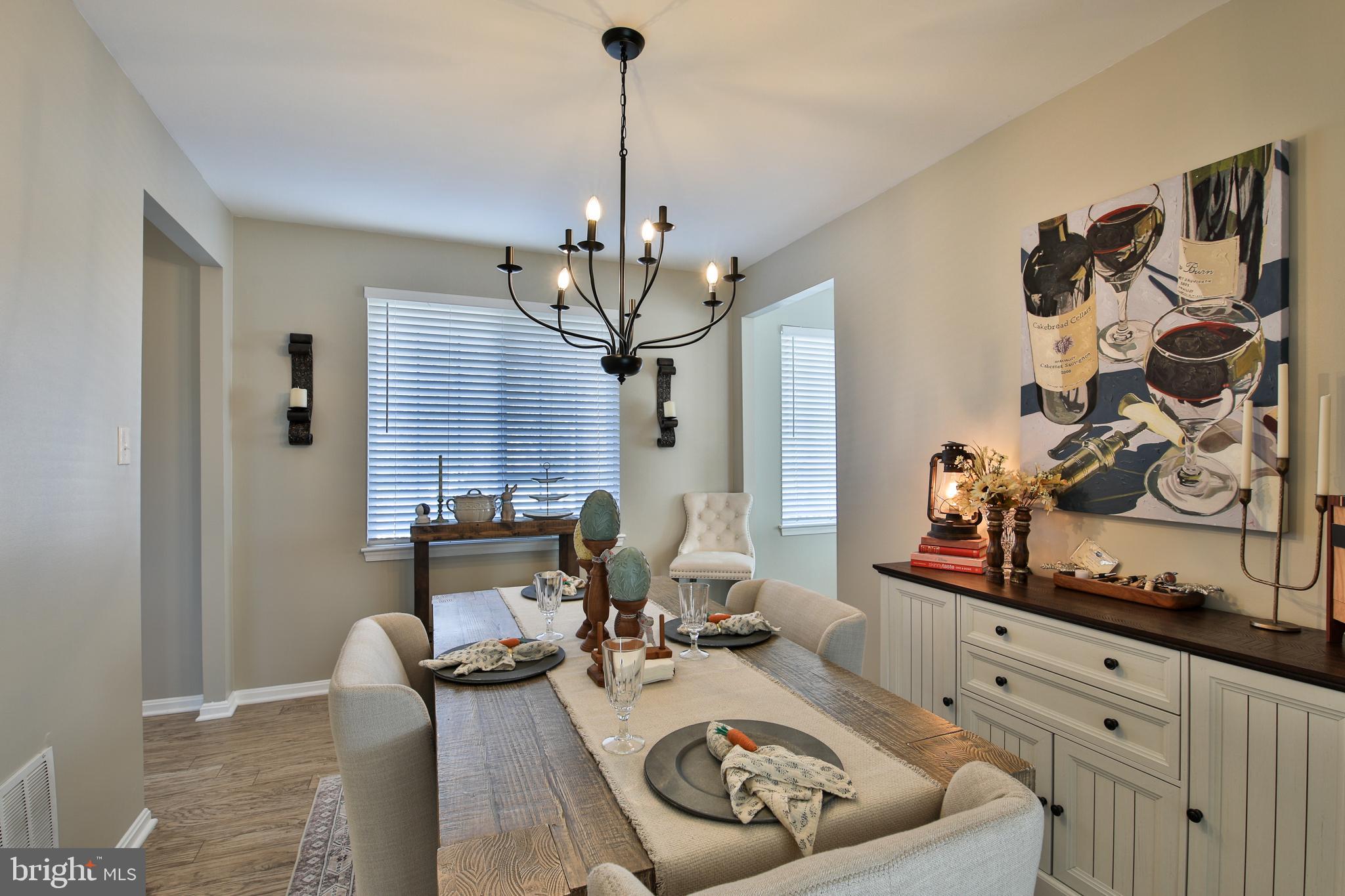 201 Mariners Point Drive Middle River, MD 21220 - Photo 22 of 52 a living room with furniture and wooden floor