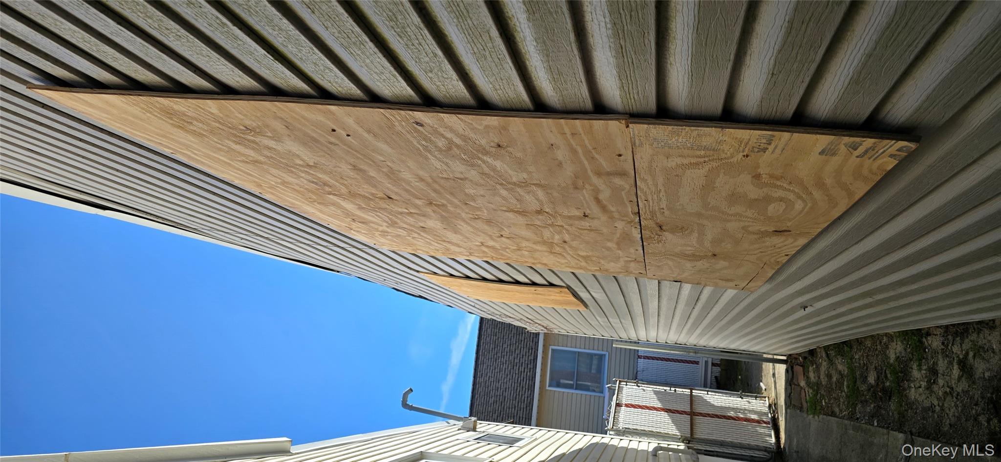 99-60 164th Road Queens, NY 11414 - Photo 3 of 21 a view of wooden balcony