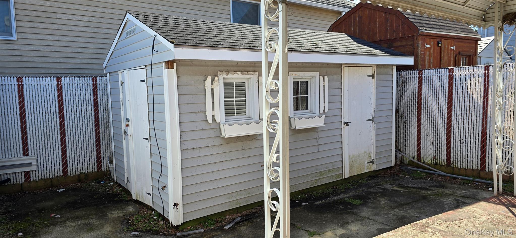 99-60 164th Road Queens, NY 11414 - Photo 6 of 21 a view of a small house