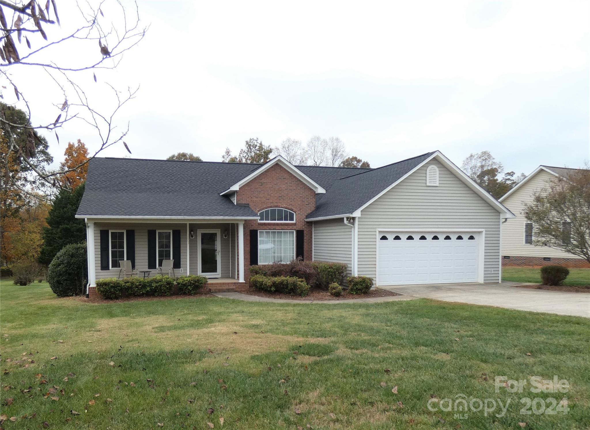 3803 River Road Hickory, NC 28602 - Photo 1 of 24 a front view of a house with garden