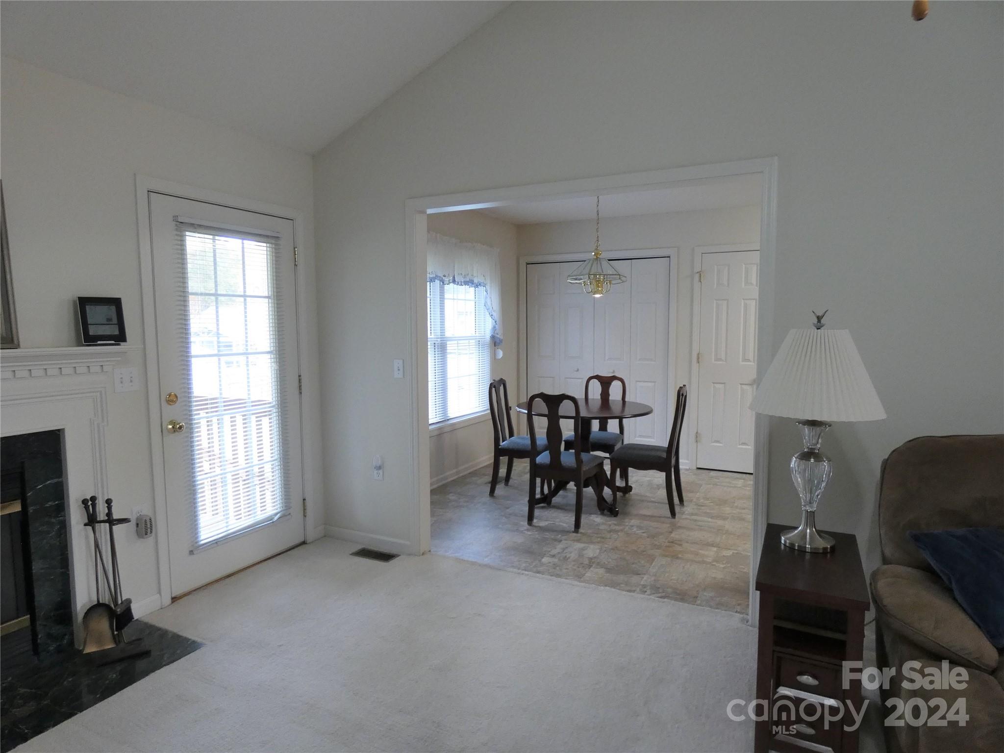 3803 River Road Hickory, NC 28602 - Photo 11 of 24 a view of a dining room with furniture and a window