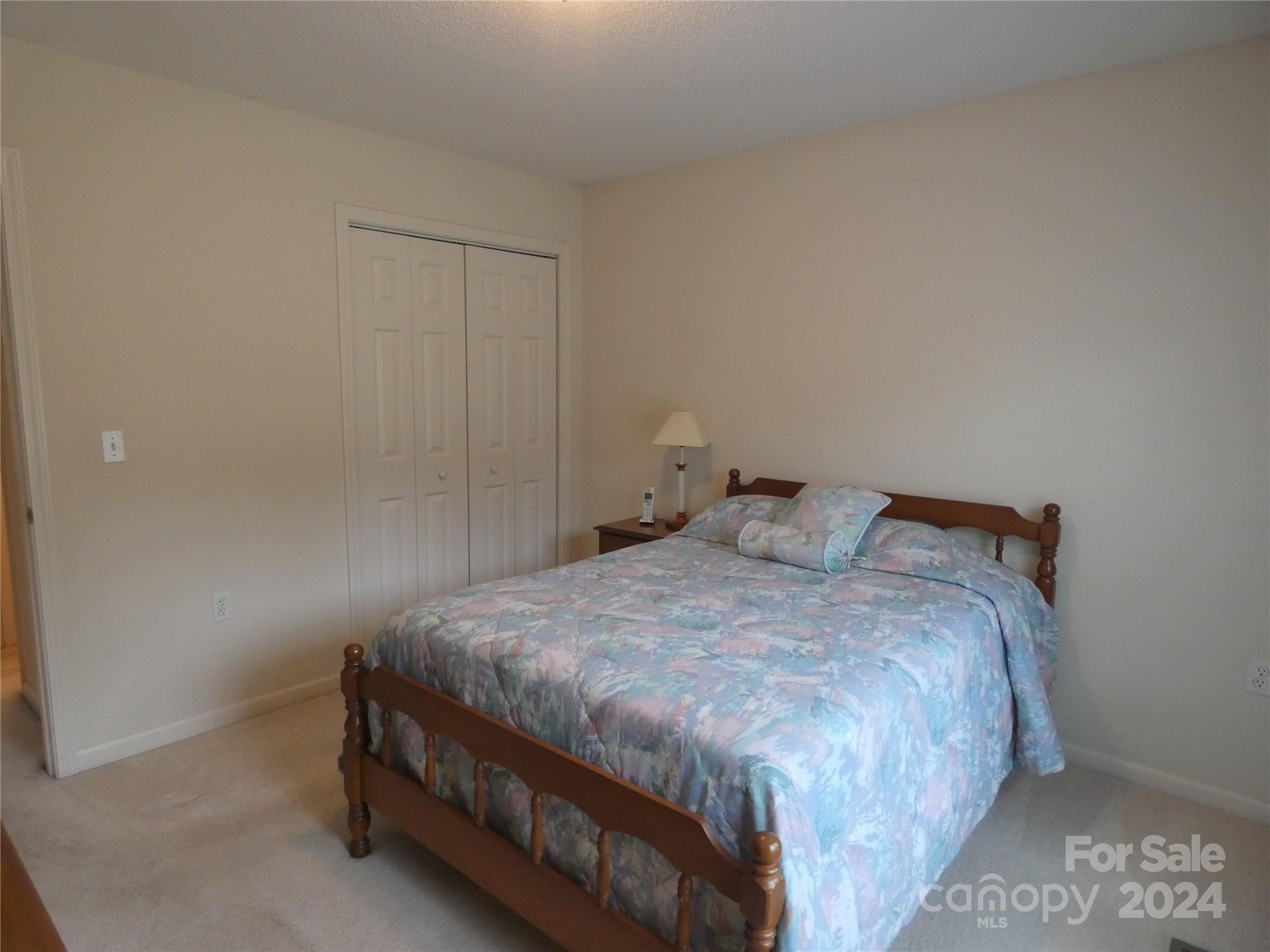 3803 River Road Hickory, NC 28602 - Photo 20 of 24 a bedroom with a bed and a window