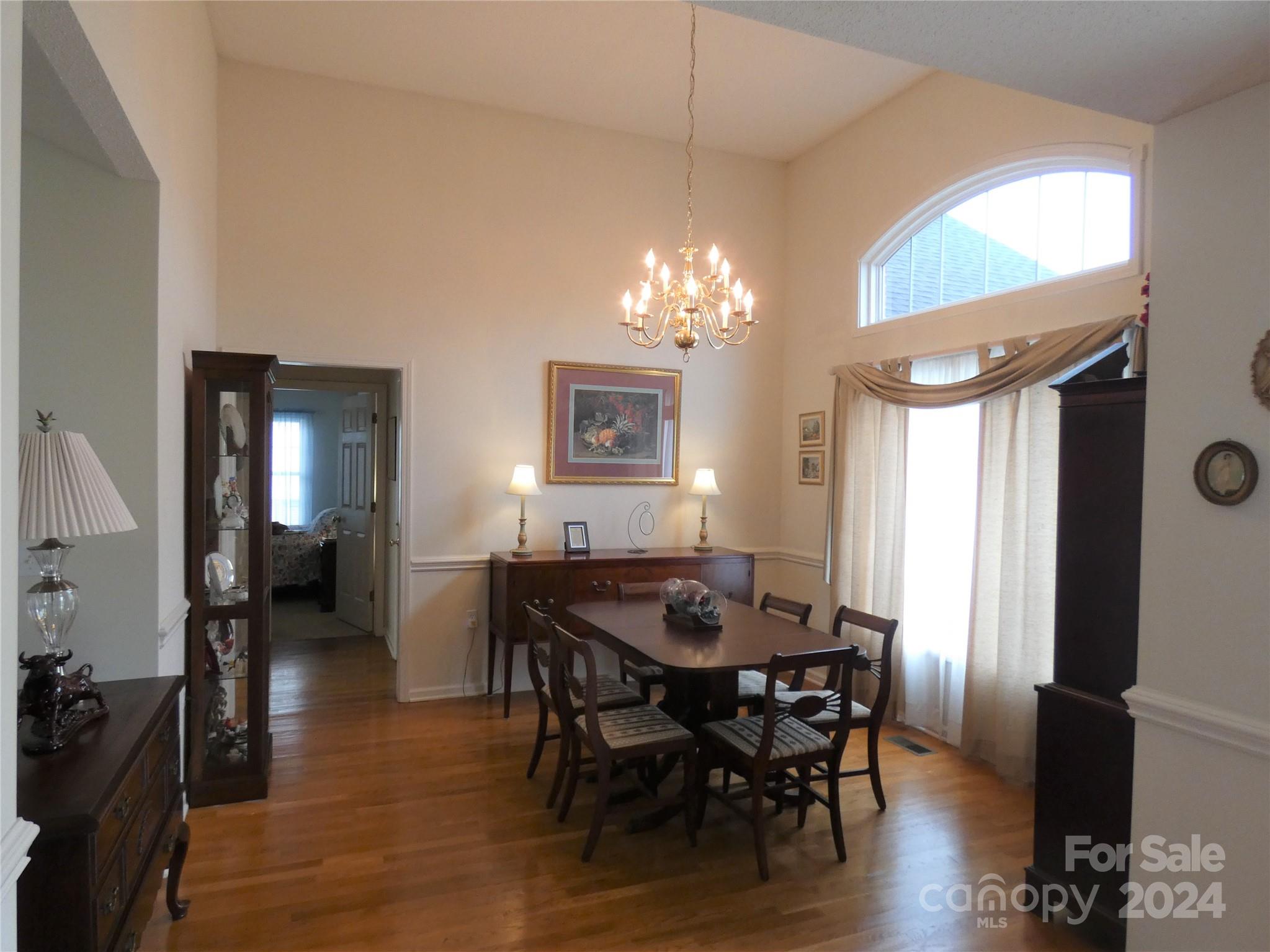 3803 River Road Hickory, NC 28602 - Photo 7 of 24 a view of a dining room with furniture and wooden floor