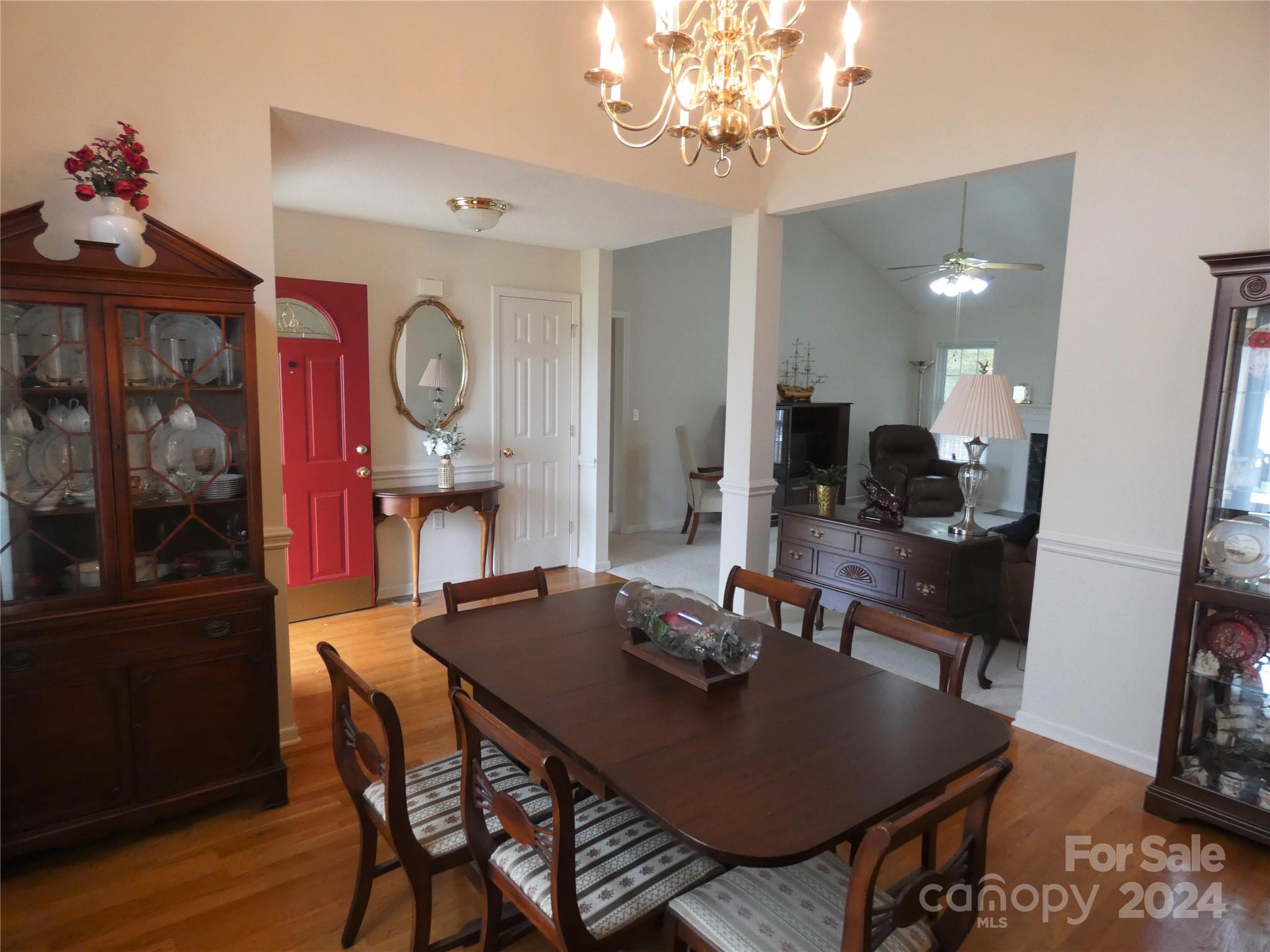 3803 River Road Hickory, NC 28602 - Photo 8 of 24 a view of a dining room with furniture and wooden floor
