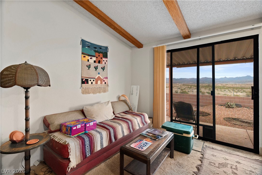 1609 Cajon Court Laughlin, NV 89029 - Photo 14 of 69 Living area featuring a mountain view and beamed ceiling
