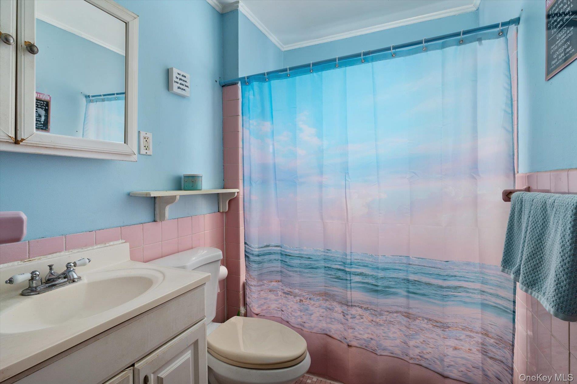 8 July Walk Long Beach, NY 11561 - Photo 14 of 14 a bathroom with a sink a toilet and shower