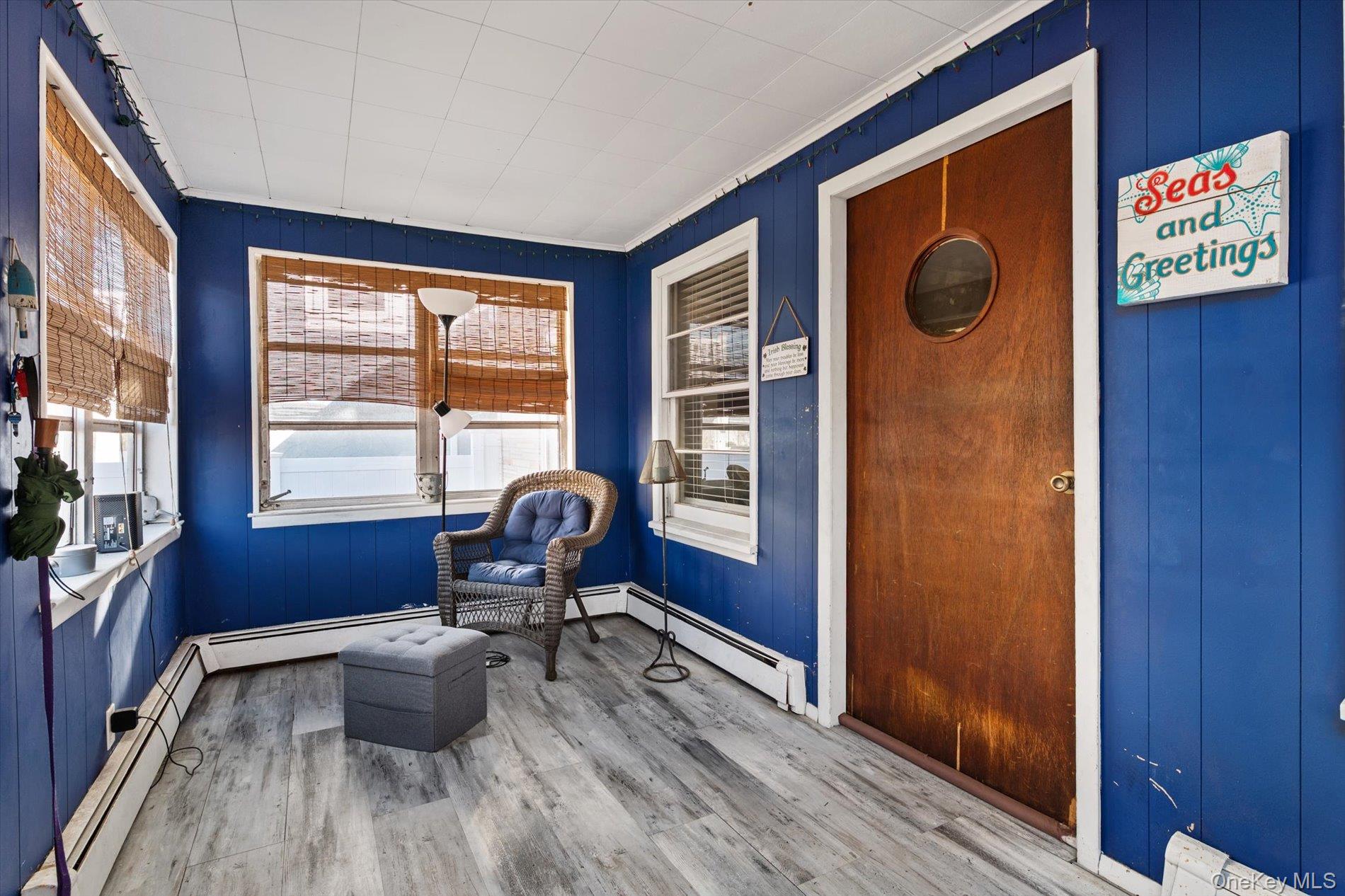 8 July Walk Long Beach, NY 11561 - Photo 5 of 14 a workspace with wooden floor and furniture