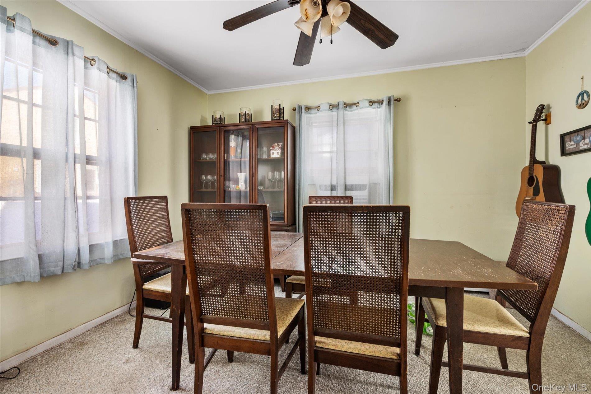 8 July Walk Long Beach, NY 11561 - Photo 8 of 14 a dining room with furniture and window