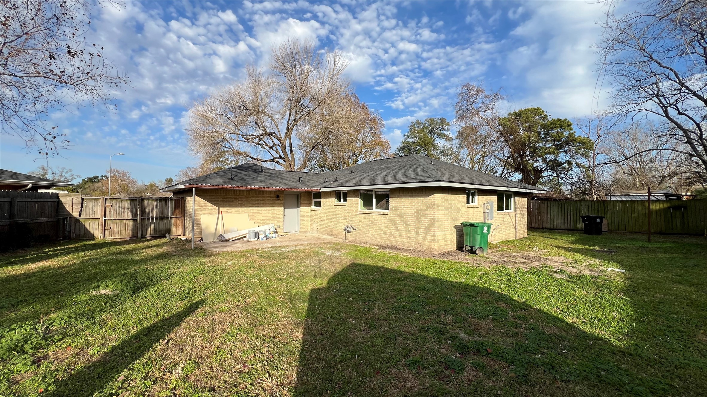 8803 Cottage Gate Lane Houston, TX 77088 - Photo 31 of 32 a front view of a house with a yard and garage