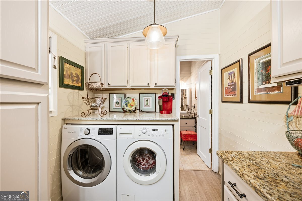 606 Morgan Road Juliette, GA 31046 - Photo 11 of 35 a view of a storage and utility room with washer and dryer