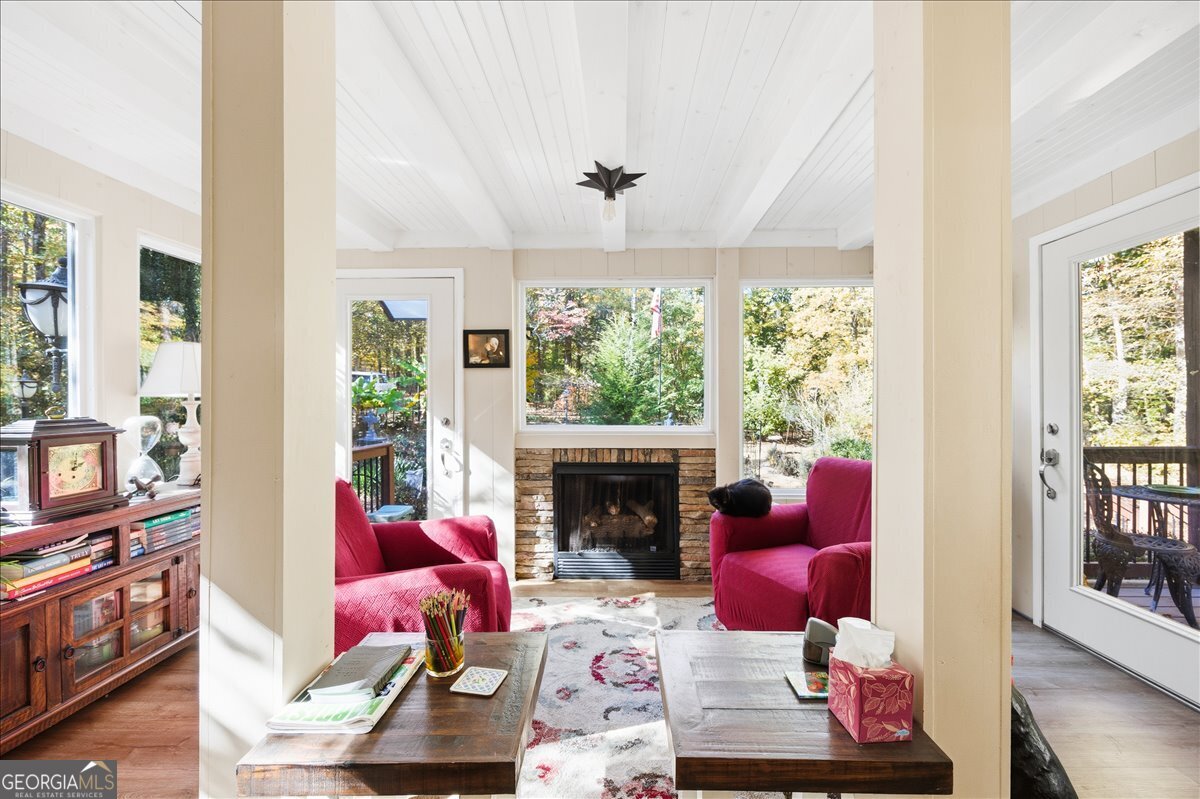606 Morgan Road Juliette, GA 31046 - Photo 17 of 35 a living room with furniture fireplace and flat screen tv