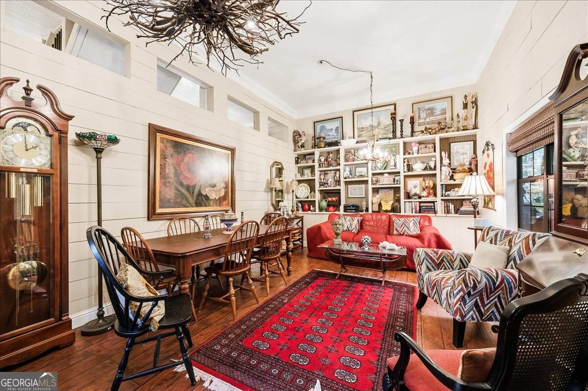 606 Morgan Road Juliette, GA 31046 - Photo 5 of 35 a living room with furniture a rug and a flat screen tv