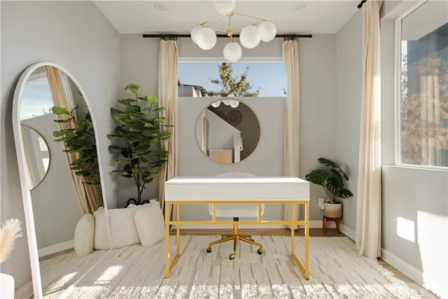 a dining room with furniture and window