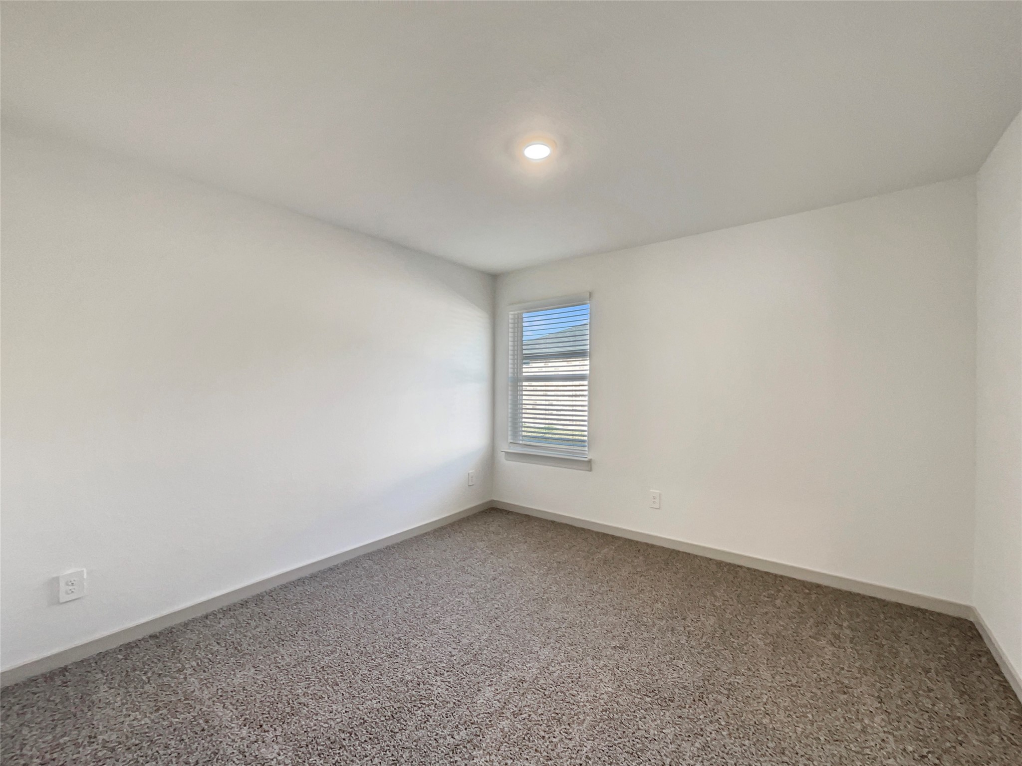 29811 Cayenne Circle Katy, TX 77494 - Photo 13 of 21 a view of an empty room and a window