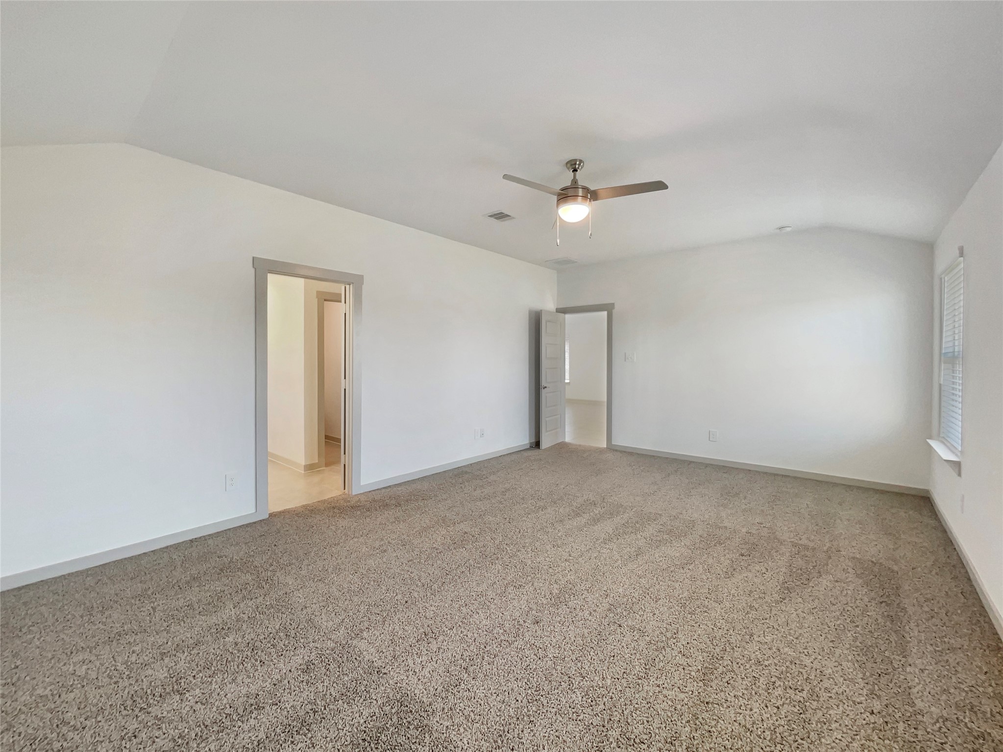 29811 Cayenne Circle Katy, TX 77494 - Photo 4 of 21 a view of an empty room with a ceiling fan