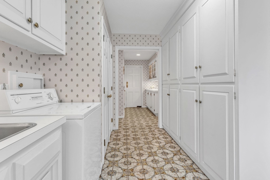 63 Ardsley Road Longmeadow, MA 01106 - Photo 15 of 41 a bathroom with a sink and a mirror