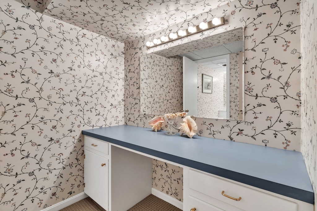 63 Ardsley Road Longmeadow, MA 01106 - Photo 26 of 41 a bathroom with a sink and a mirror