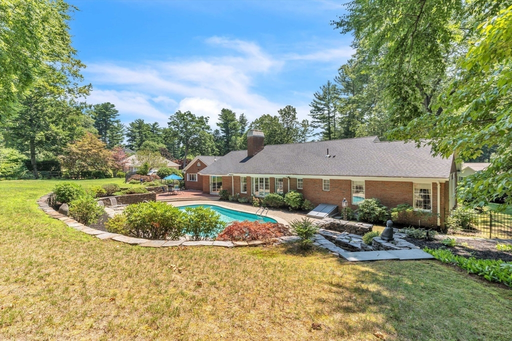 63 Ardsley Road Longmeadow, MA 01106 - Photo 33 of 41 a view of a house with pool fire pit and chairs