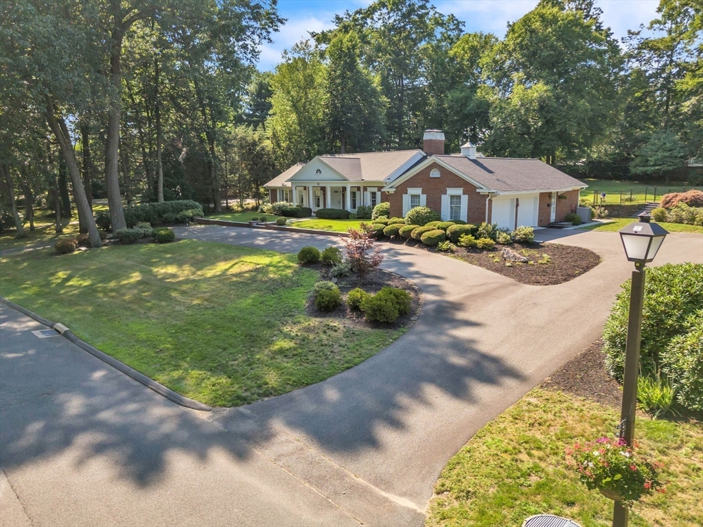 63 Ardsley Road Longmeadow, MA 01106 - Photo 36 of 41 a front view of a house with a yard