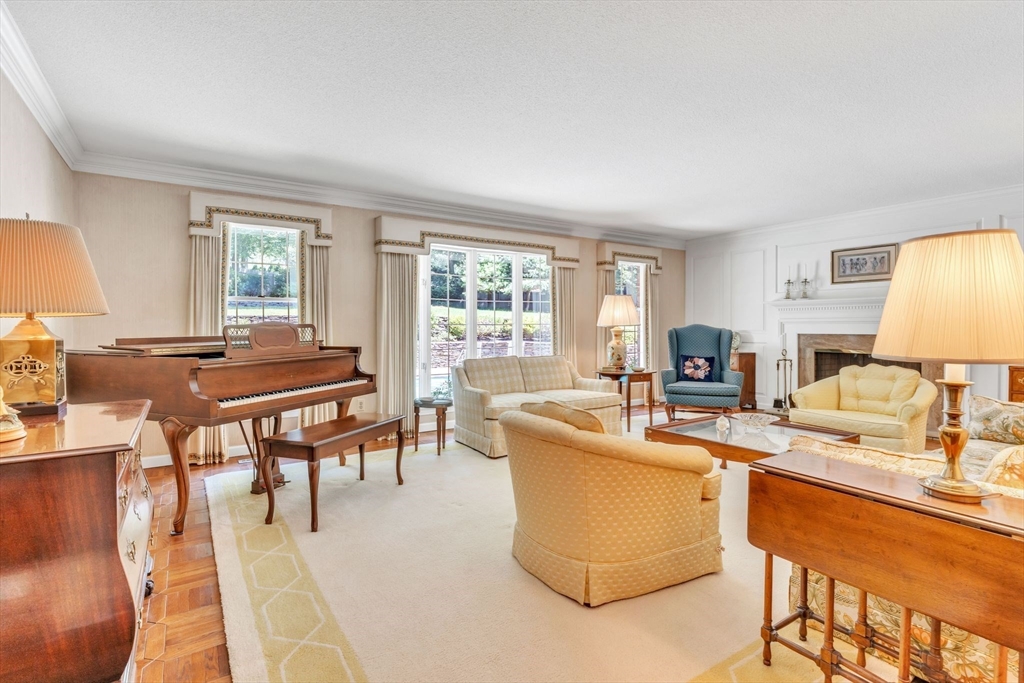 63 Ardsley Road Longmeadow, MA 01106 - Photo 6 of 41 a living room with furniture a table and a window