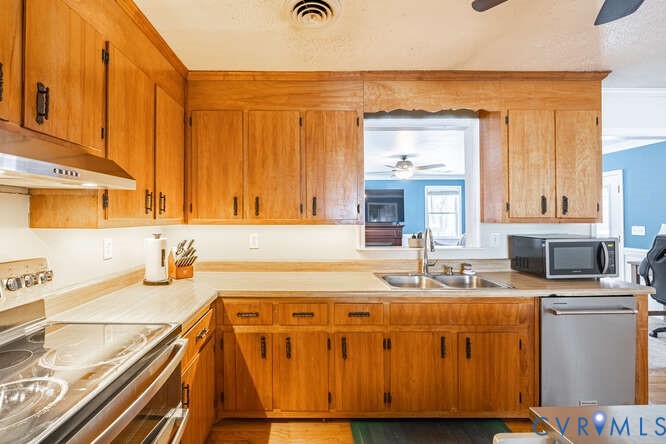 11623 Cox Road Church Road, VA 23833 - Photo 15 of 41 a kitchen with a sink stove and cabinets