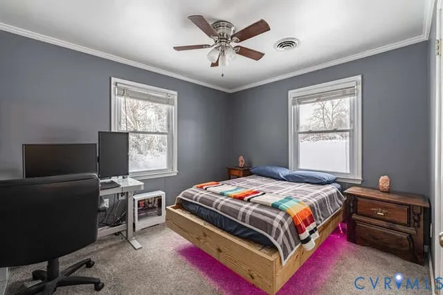 a workspace with furniture and a window