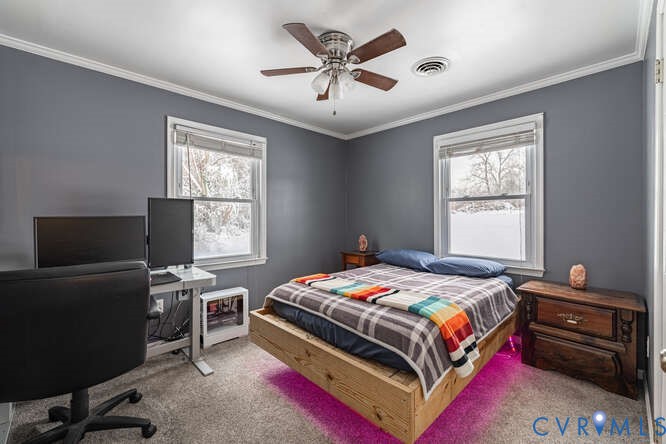 11623 Cox Road Church Road, VA 23833 - Photo 18 of 41 a bedroom with a bed and a window