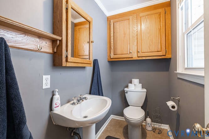 11623 Cox Road Church Road, VA 23833 - Photo 25 of 41 a bathroom with a toilet sink and mirror