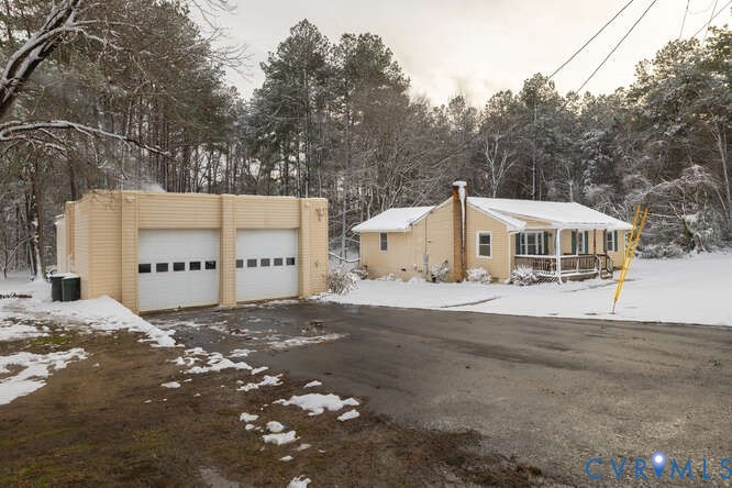 11623 Cox Road Church Road, VA 23833 - Photo 3 of 41 a view of a white house with a large tree in front of it