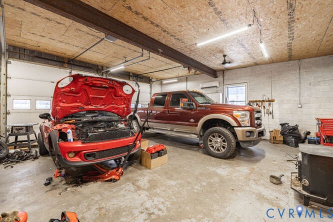 11623 Cox Road Church Road, VA 23833 - Photo 39 of 41 a car is parked in a garage