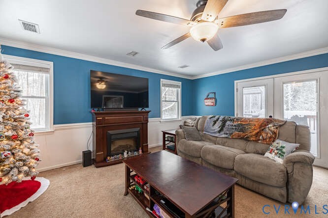11623 Cox Road Church Road, VA 23833 - Photo 9 of 41 a living room with furniture and a fireplace