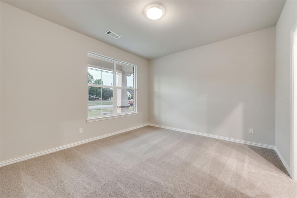 3709 Washington Street Greenville, TX 75401 - Photo 14 of 24 an empty room with a window