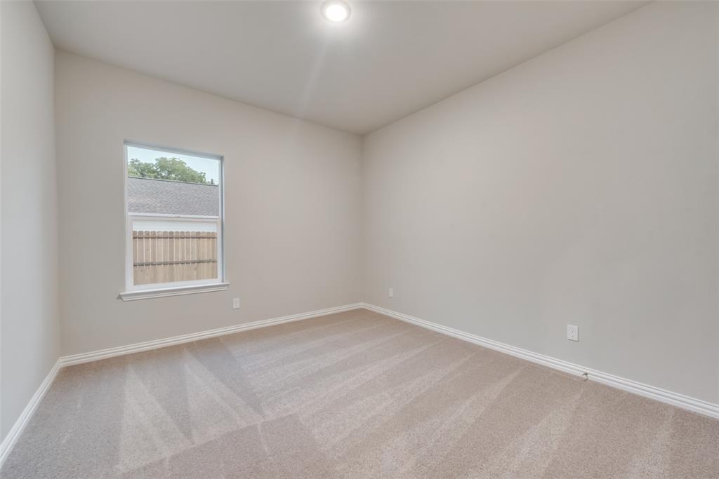 3709 Washington Street Greenville, TX 75401 - Photo 16 of 24 an empty room with a window