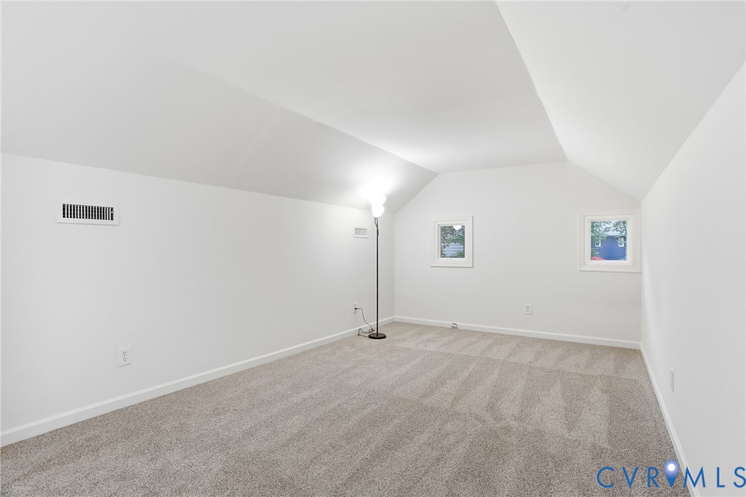 13913 Barnes Spring Road Midlothian, VA 23112 - Photo 34 of 51 Bright room with white painted walls and sloped ce