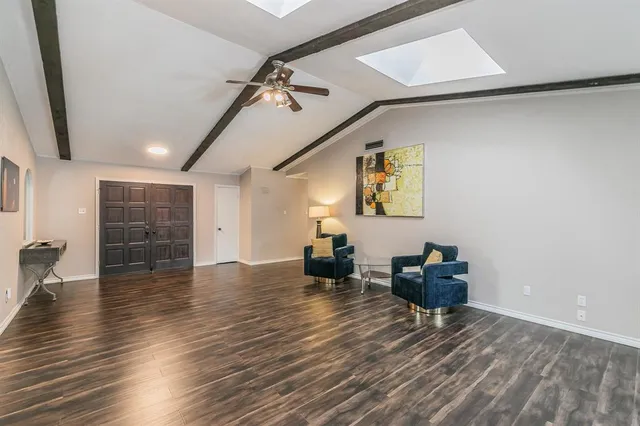 a kitchen with stainless steel appliances granite countertop a refrigerator stove and sink