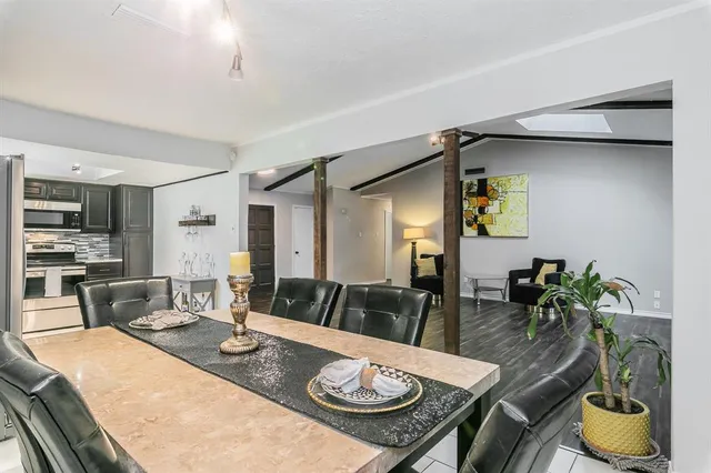 a workspace with furniture and a window