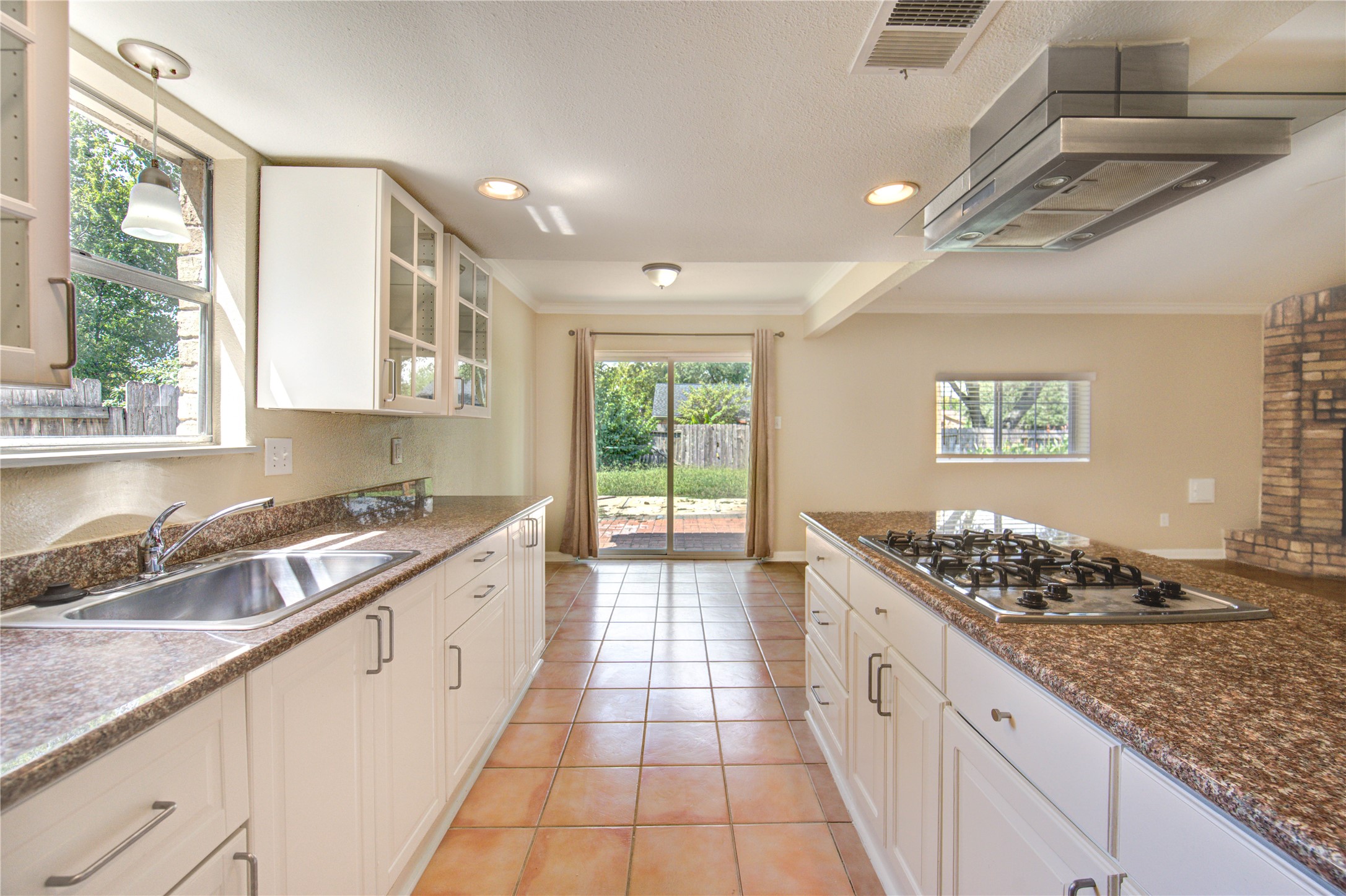 3702 Royal Manor Drive Houston, TX 77082 - Photo 12 of 29 a large kitchen with stainless steel appliances granite countertop a sink and a counter space
