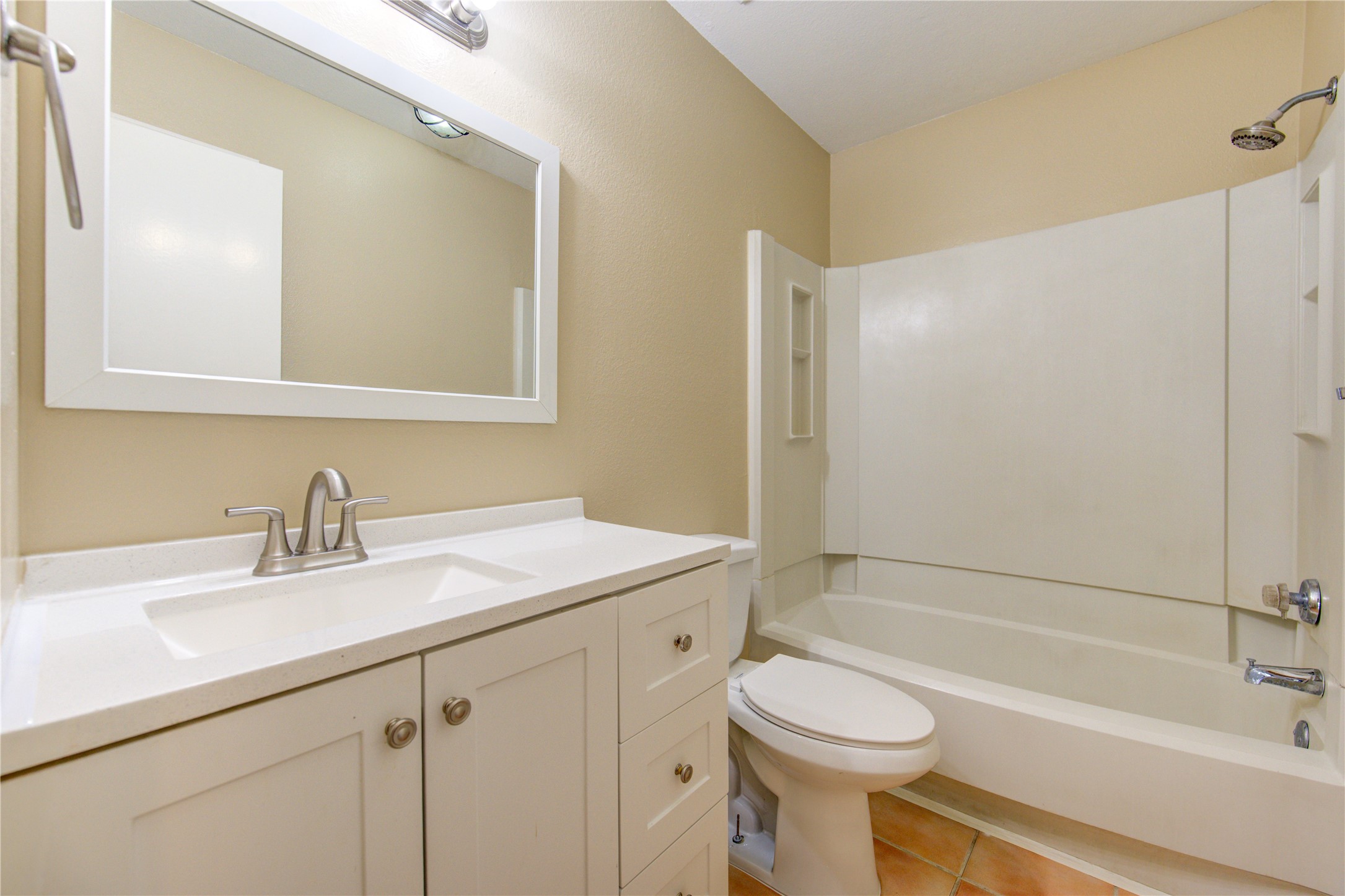 3702 Royal Manor Drive Houston, TX 77082 - Photo 13 of 29 a bathroom with a sink a toilet and a bathtub