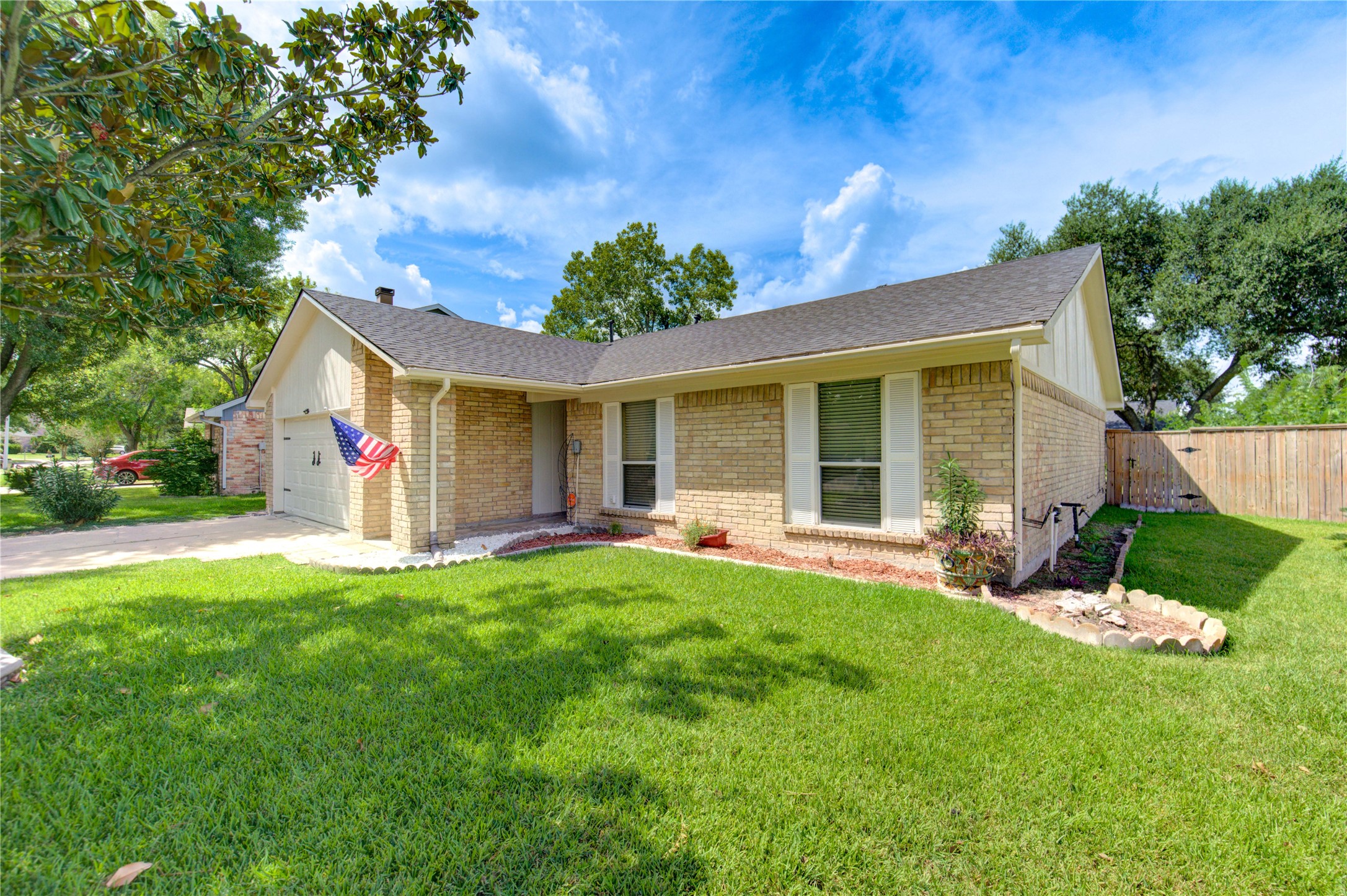 3702 Royal Manor Drive Houston, TX 77082 - Photo 4 of 29 a view of a house with a yard and tree s