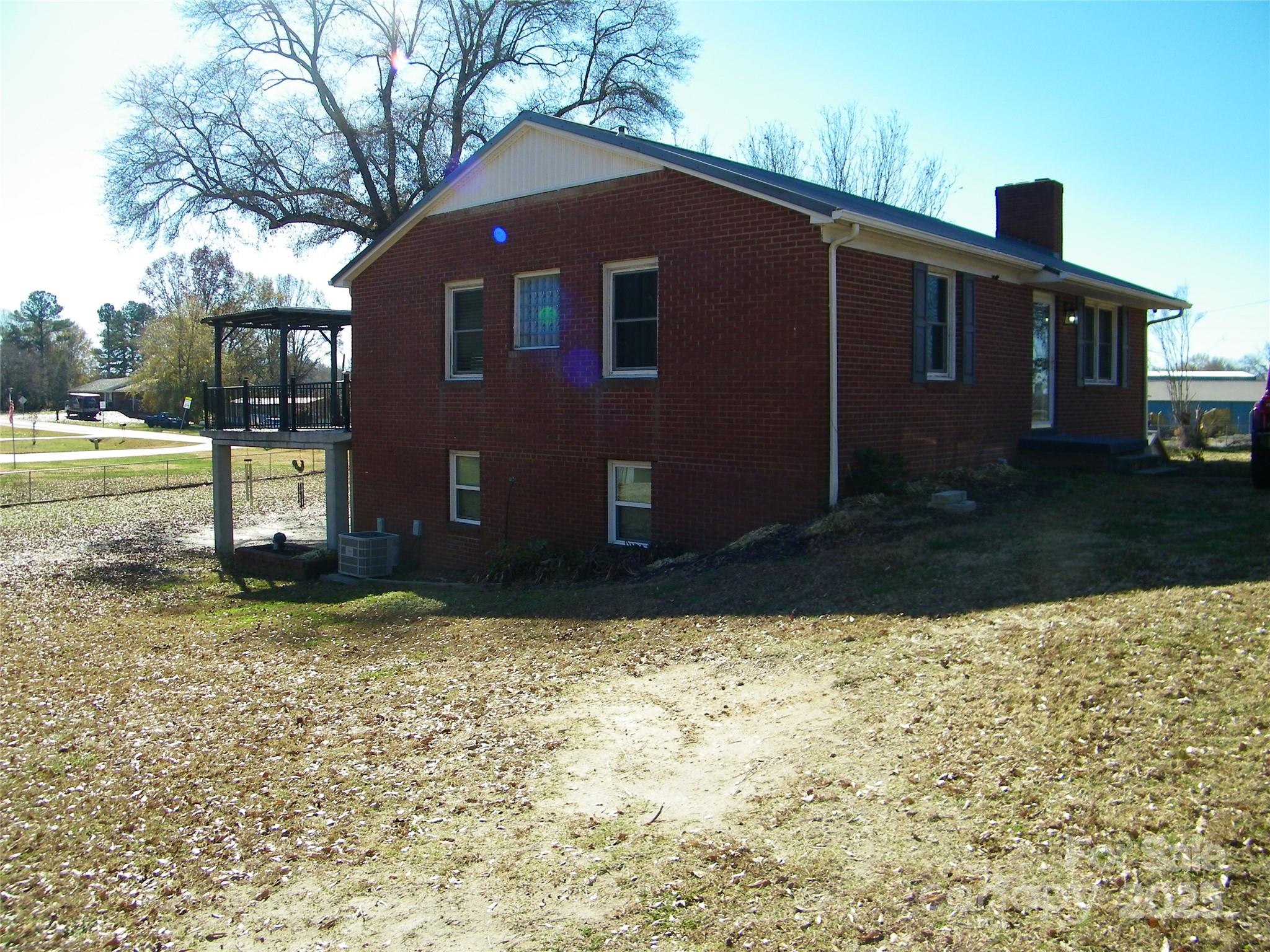 2353 South Post Road Shelby, NC 28152 - Photo 1 of 31 a front view of a house with garden