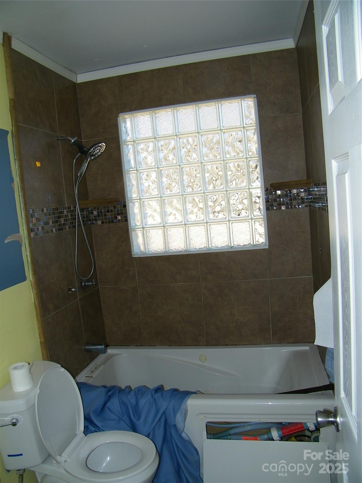 2353 South Post Road Shelby, NC 28152 - Photo 12 of 31 a bathroom with a sink toilet and shower