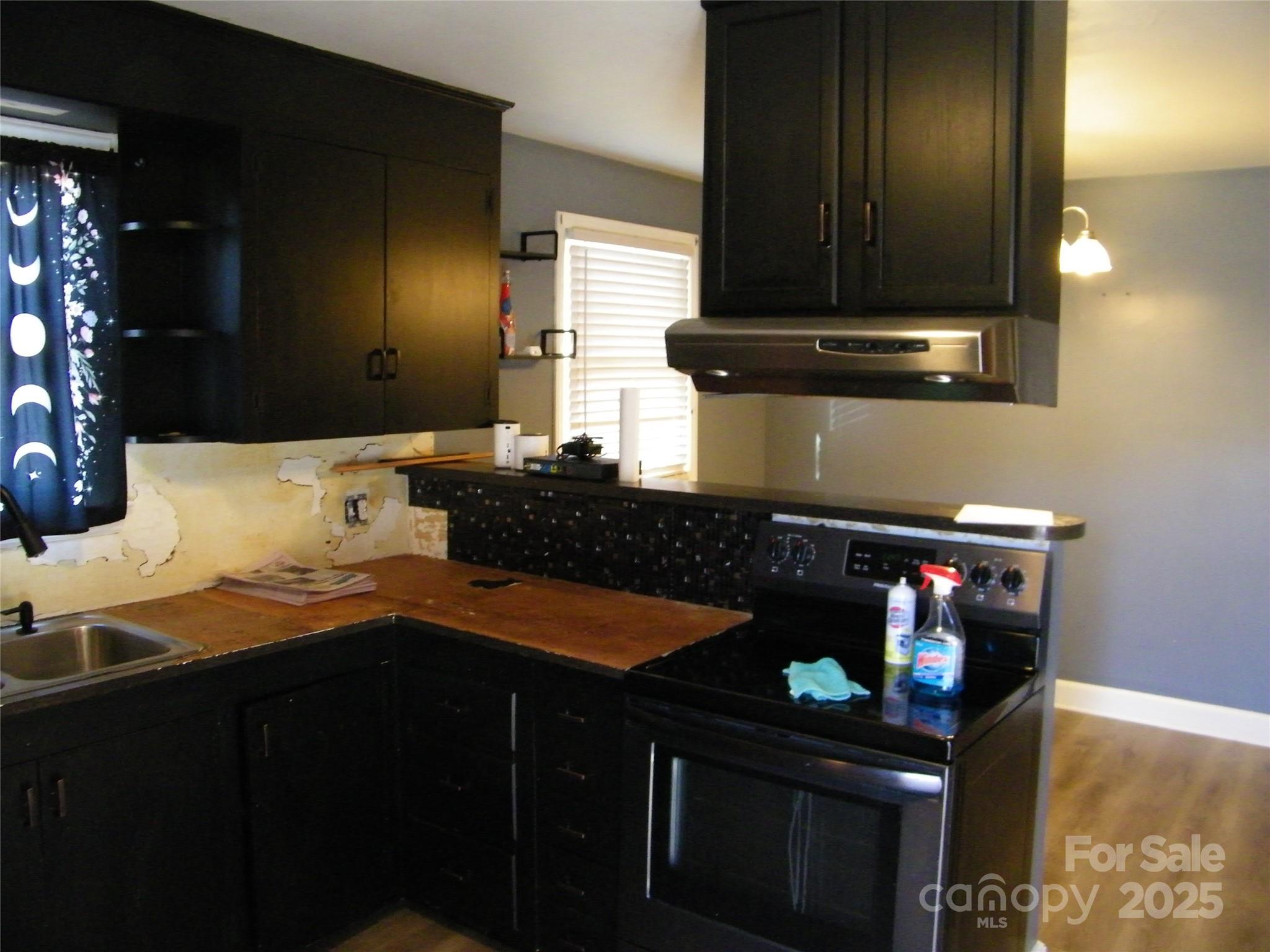 2353 South Post Road Shelby, NC 28152 - Photo 15 of 31 a bathroom with a sink and a mirror