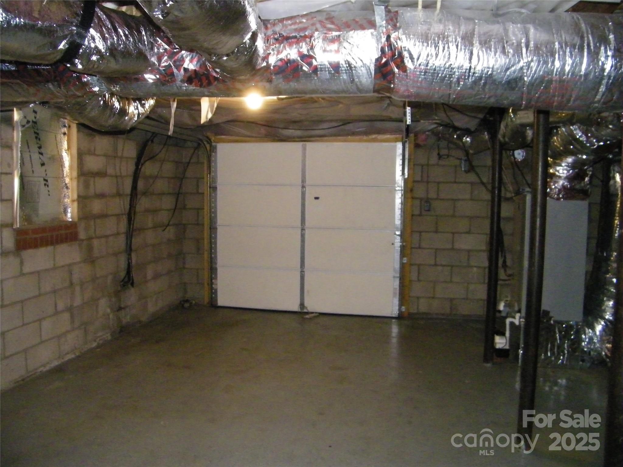 2353 South Post Road Shelby, NC 28152 - Photo 23 of 31 a view of water heater room with a hallway