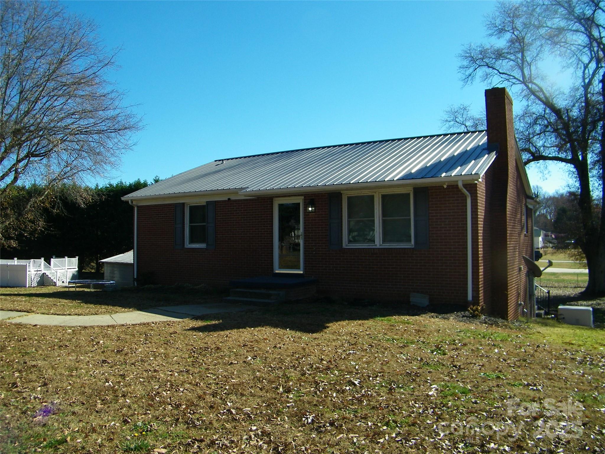 2353 South Post Road Shelby, NC 28152 - Photo 5 of 31 a front view of a house with a yard