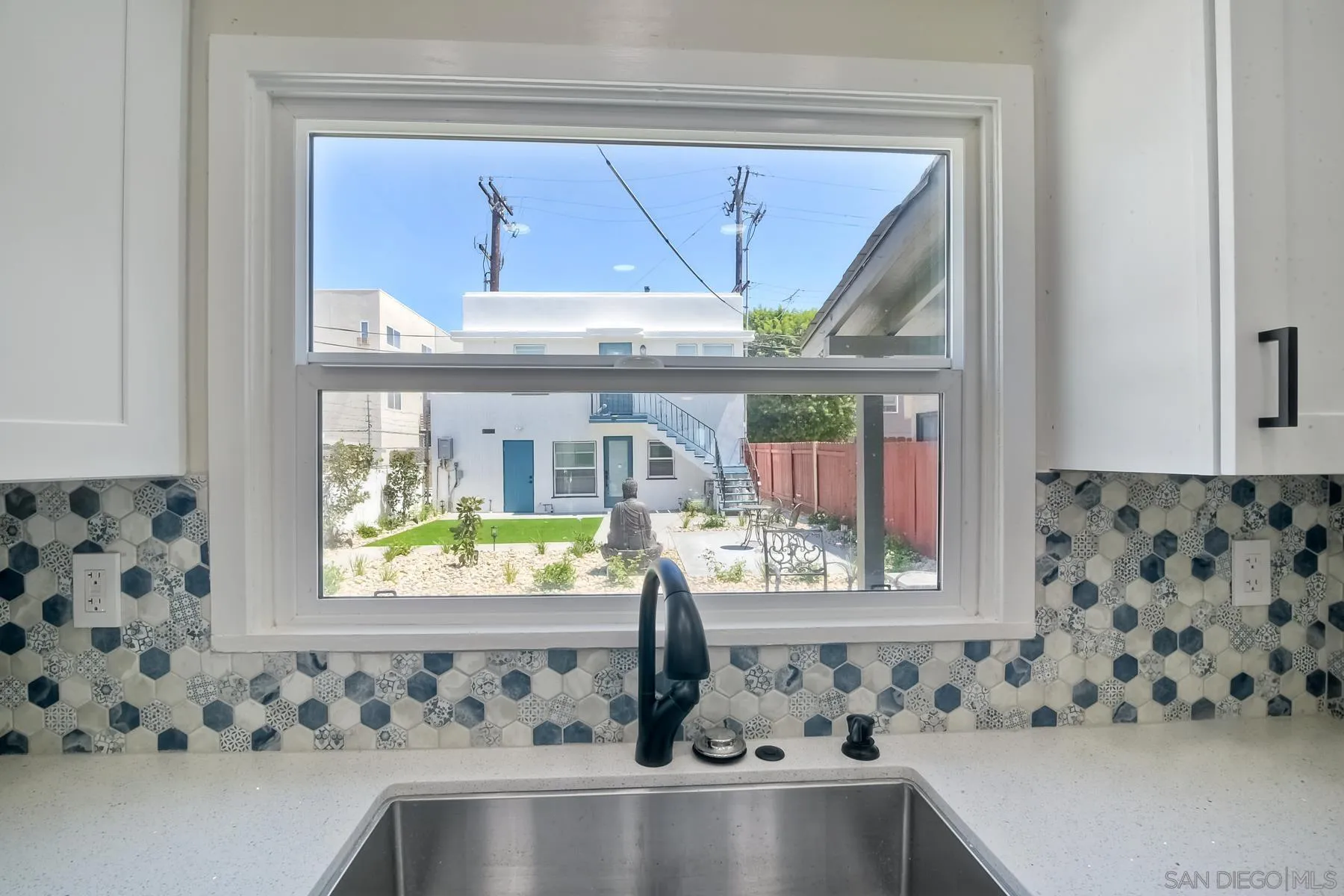 4685 Hamilton Street San Diego, CA 92116 - Photo 23 of 37 a bathroom with a sink and a bathtub