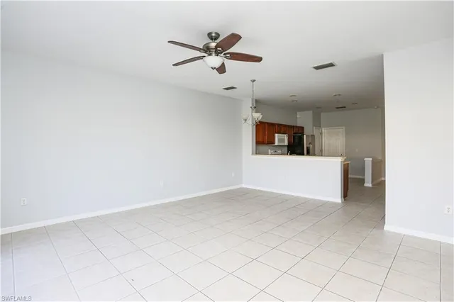 a view of a livingroom with a ceiling fan