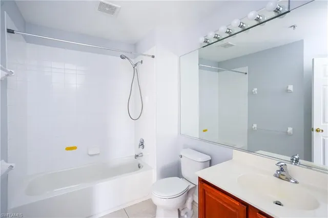 a bathroom with a sink a toilet and a bathtub