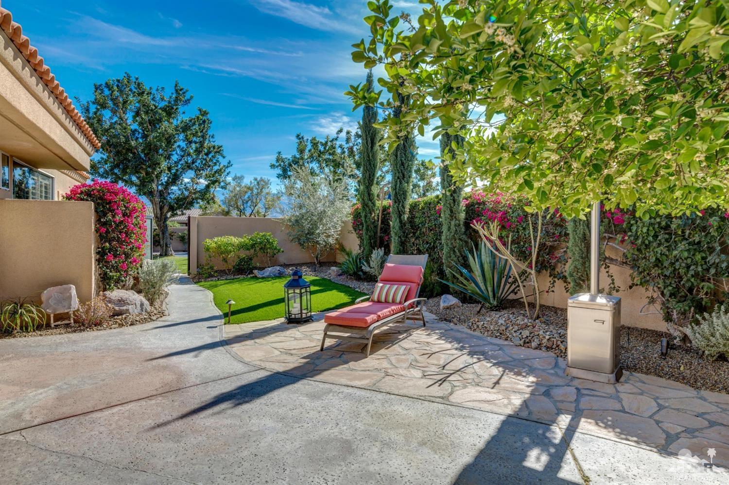 2 Hilton Head Drive Rancho Mirage, CA 92270 - Photo 2 of 40 a garden view with a seating space