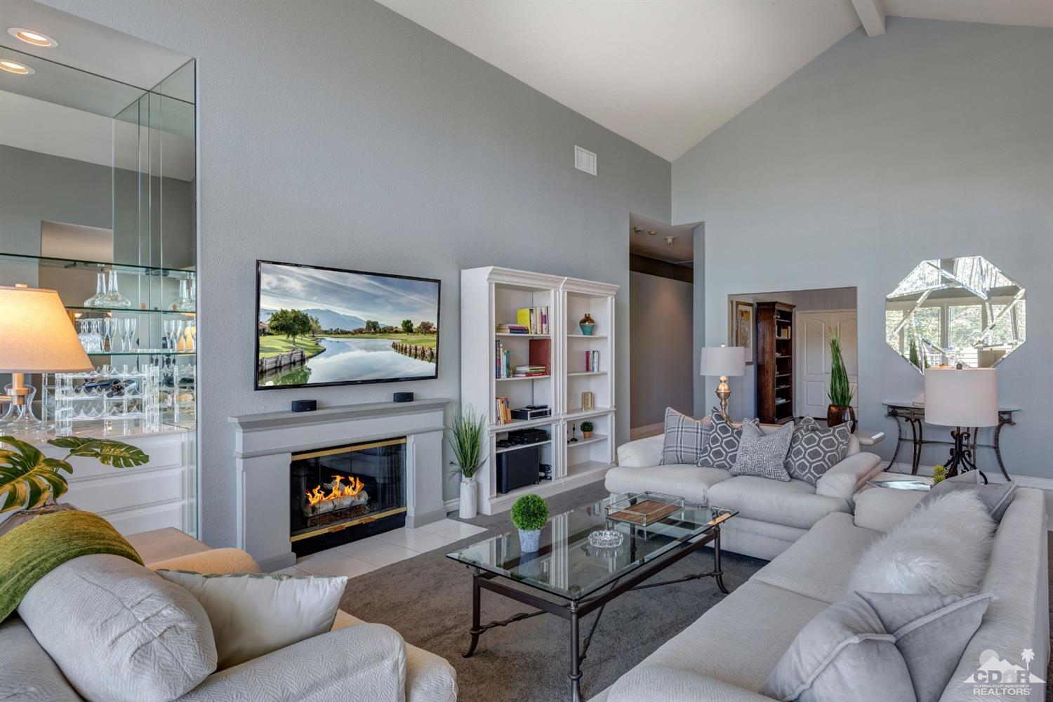 2 Hilton Head Drive Rancho Mirage, CA 92270 - Photo 12 of 40 a living room with furniture and a fireplace